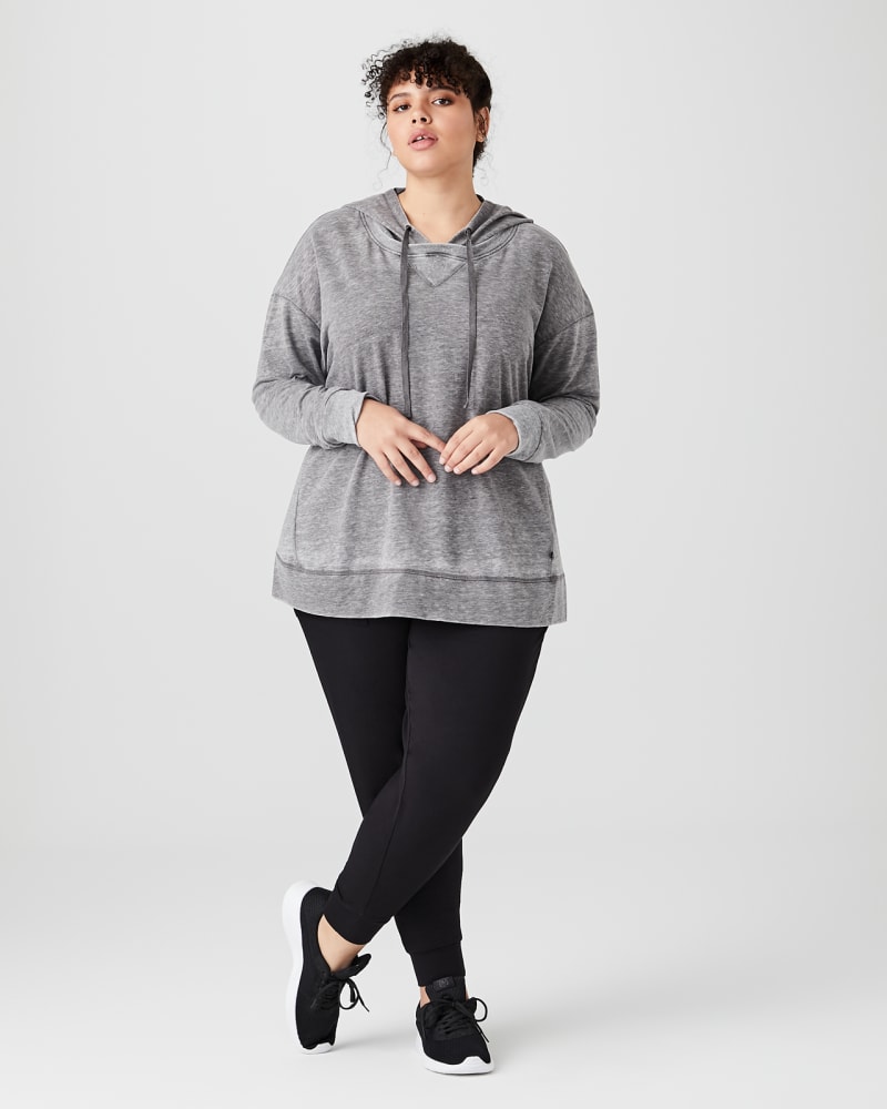 Plus size model with pear body shape wearing Evie Pullover Hoodie by Marika | Dia&Co | dia_product_style_image_id:142085
